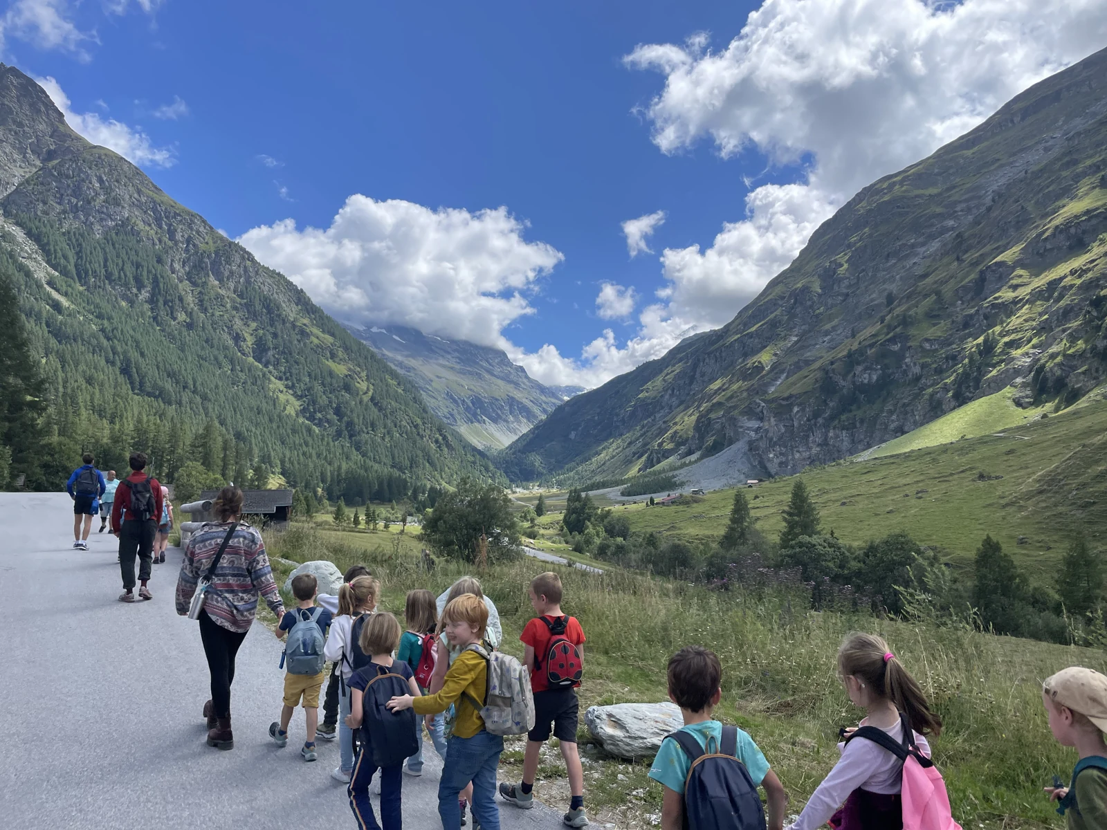 A walk through an Alpine valley with a group